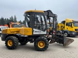 2010 Mecalac 12MTX wheel excavator, side view