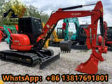 2023 Kubota U55-4 mini excavator, side profile view