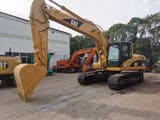 Гусеничный экскаватор 2008 Caterpillar 320CL, вид сбоку