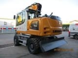 2023 Liebherr A916 Litronic wheel excavator, rear three-quarter view