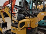 2026 XCMG XE17U mini excavator, rear three-quarter view