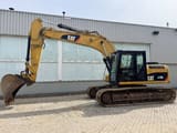 2012 Caterpillar 319D L crawler excavator, side view