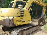 Komatsu PC60 crawler excavator, rear three-quarter view