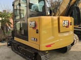 2026 Caterpillar 305.5E2 mini excavator rear three-quarter view