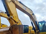 2023 Caterpillar 352 crawler excavator, close-up of boom and bucket