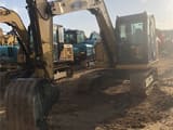 2023 Caterpillar 307E2 mini excavator, front three-quarter view