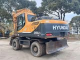 2023 Hyundai R210W-9 wheel excavator rear three-quarter view