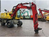 2004 Atlas 1305 M wheel excavator, side profile view