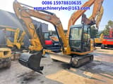 2023 Caterpillar 305.5E2 mini excavator, front three-quarter view