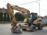 2003 Caterpillar M313C wheel excavator, side view