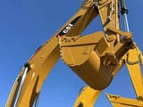 Caterpillar 336D crawler excavator boom and bucket detail