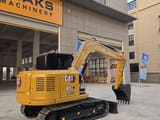 2024 Caterpillar 307E2 mini excavator, rear three-quarter view