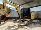 2022 Caterpillar 305.5E2 mini excavator, side view