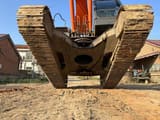 2022 Hitachi ZX210-3 excavator, low angle undercarriage view
