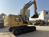 Caterpillar 320GC crawler excavator, rear three-quarter view