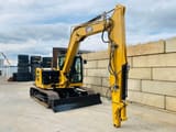 2019 Caterpillar 309 CR mini excavator, front three-quarter view