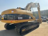 2019 Caterpillar 320CL crawler excavator rear three-quarter view