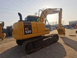 2021 Komatsu PC130-7 mini excavator, rear three-quarter view