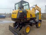 2016 Hyundai 60W-7 wheel excavator, rear three-quarter view