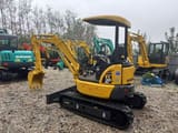 2023 Komatsu PC30MR-3 mini excavator, rear three-quarter view