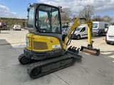 2024 Wacker Neuson EZ26 mini excavator, rear three-quarter view