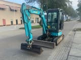 2007 Airman AX30U-4 mini excavator, front three-quarter view