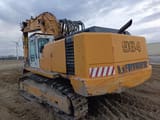 2000 Liebherr R964 crawler excavator rear three-quarter view