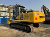 2024 Komatsu PC220 crawler excavator, rear three-quarter view