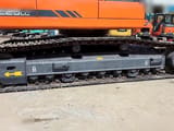 2020 Doosan DX225LC crawler excavator side view of the undercarriage