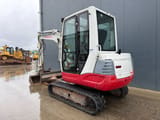 2010 Takeuchi TB235 mini excavator, rear three-quarter view