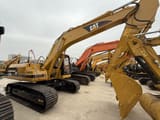 2022 Caterpillar 320BL crawler excavator, rear three-quarter view