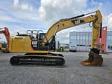 2014 Caterpillar 320EL crawler excavator, side view