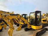 2022 Caterpillar 303.5E mini excavator, front three-quarter view