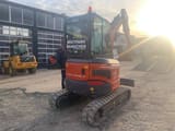 2023 XCMG XE27E mini excavator, rear three-quarter view