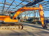 Doosan DX140LC-5 crawler excavator side view