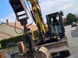 2020 Yanmar B110W wheel excavator, front three-quarter view
