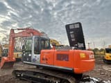 Hitachi Zaxis 240G crawler excavator, rear three-quarter view