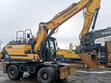 2016 Hyundai HW140 wheel excavator, side view