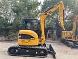2022 Caterpillar 303.5 C CR mini excavator, front three-quarter view