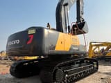 2025 Volvo EC290 crawler excavator, rear three-quarter view