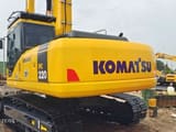 2023 Komatsu PC220-7 crawler excavator, rear three-quarter view