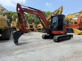 2019 Kubota KX057-4 mini excavator, side view