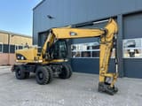 2011 Caterpillar M315D wheel excavator, side profile view