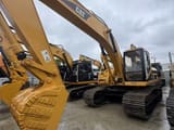2019 Caterpillar 325BL crawler excavator, front three-quarter view