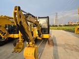 2021 Caterpillar 303.5E mini excavator, front view