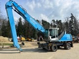 2011 Fuchs MHL340 wheel excavator, side profile view