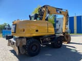 2014 Caterpillar M313D wheel excavator, rear three-quarter view
