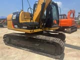 2013 Caterpillar 312D2 crawler excavator, rear three-quarter view