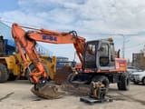 2003 Fiat-Kobelco EX135W wheel excavator, side view