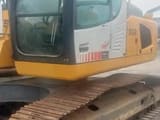 2019 Liebherr R922 LITR. crawler excavator, side view of cab and tracks